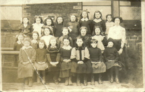 Granny Burrell (Mary Macgregor) at school, middle row third left
